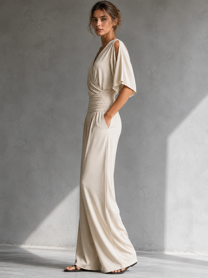 Combinación elegante con efecto cartera y piernas anchas