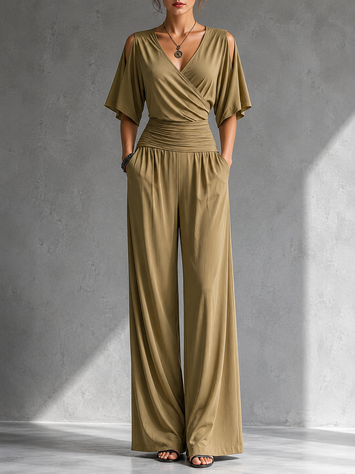 Combinación elegante con efecto cartera y piernas anchas